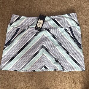Adidas women’s golf skirt xl 
Brand new with tags 
Shorts under 
Pockets